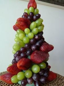 fruit pyramid/castle with grapes and strawberries